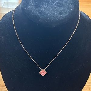 - Pink holiday motif and rose gold hardware